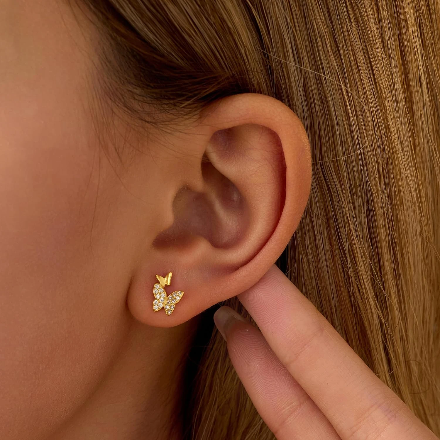 KIFUTENG double butterfly earrings in a model wearing view
